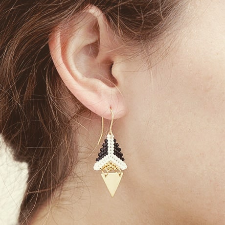 Dual Triangle. Fragment. Black, white and gold